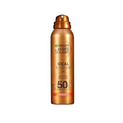 Image of Garnier Ambre Solaire Fake Tan SPF 50 Ideal Bronze Tanning Mist, For Face & Body, Tan Enhancing, Invisible on All Skin Tones, Quick Dry, Water Resistant, 0% Alcohol, High UV Protection 150ml