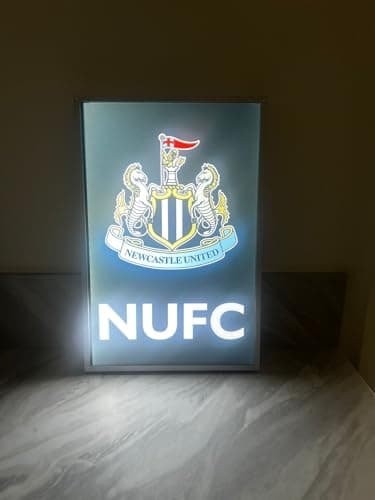 Image of Newcastle United FC LED Light Up Wall Sign with Club Crest, NUFC Slogan, Silver Frame, 33cm x 19cm x 5cm, Battery Operated