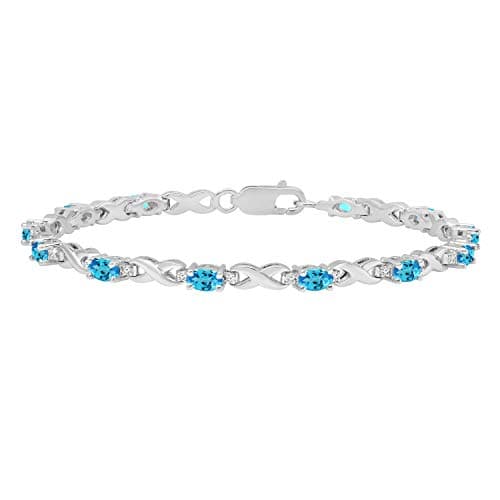 Image of Dazzlingrock Collection 5 mm Oval Blue Topaz & Round White Diamond Ladies Infinity Link Bracelet, Sterling Silver