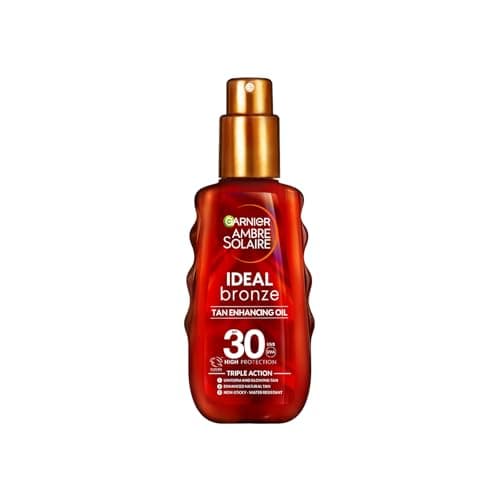 Image of Garnier Ambre Solaire Sun Cream Spray SPF 30 Ideal Bronze Protective Oil Sunscreen, Tan Enhancing, High Sun Protection Factor 30, Shea Butter, Water Resistant, Non-Greasy, UVA & UVB Protect 150ml