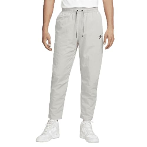 Image of Nike Sportswear Tech Essentials Men's Lined Commuter Pants, Cobblestone/Black, Small