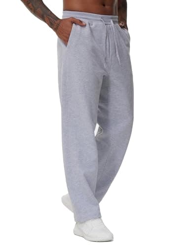 Image of THE GYM PEOPLE Men's Baggy Fleece Joggers with Pockets Drawstring Tracksuit Bottoms Sport Casual Sweatpants Grey