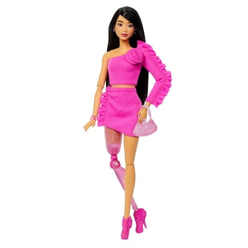 Image of Barbie Deluxe Style Doll #2 in Barbiecore Outfit, Black Hair and Glittery Prosthetic Leg, Pink Top and Skirt Set with Rosette Detail and Accessories