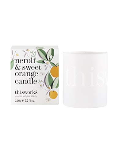 Image of This Works Neroli and Sweet Orange Candle, 220 g - Luxury Candle Enriched with Essential Oils - Hand Poured Scented Candle with a 40hr Burn Time for a Revitalising Aromatherapy Experience