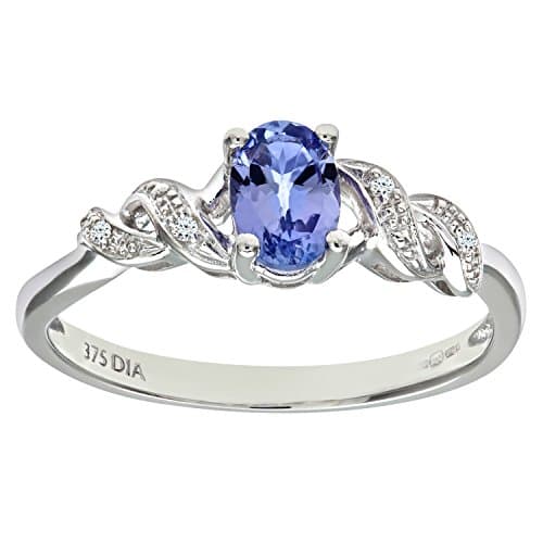 Image of Naava Women's 9 ct White Gold Oval Tanzanite Ring with Pave Set Diamond Twist Shoulders