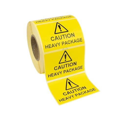 Image of 75mm x 50mm Caution Heavy Package Labels/Stickers. Yellow Labels, Black Print. Strong Permanent Adhesive. 500 per roll.