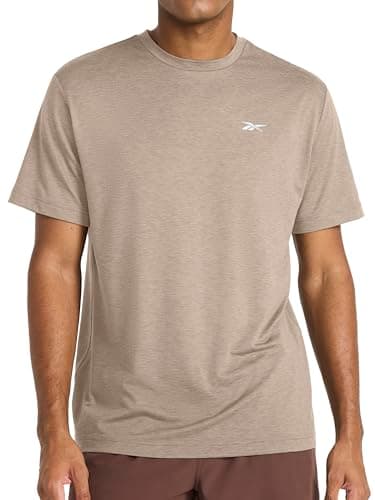 Image of Reebok Apparel Mens Strike Short Sleeve Crewneck T-Shirt, Standard Fit, Lightweight Stretch Poly Jersey Fabric, Gritty Grey Heather, Large