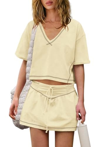 Image of Yanekop Skort Sets Women 2 Piece Outfits Two Piece Matching Workout Sets Crop Tops and Mini Skirt Set, Light Yellow, M