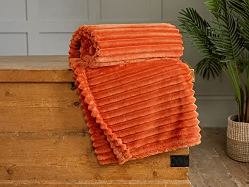 Image of Deyongs Ribbed Radley Soft Faux Fur Throw in Pumpkin Orange 130cm x 150cm