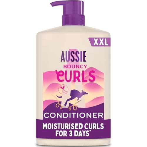 Image of Aussie Bouncy Curls Shampoo 1000ml. Gently Cleanses and Moisturises Wavy and Curly Hair. Infused with Jojoba, Coconut and Australian Macadamia Nut Oils. Silicone-Free, Vegan and Cruelty-Free