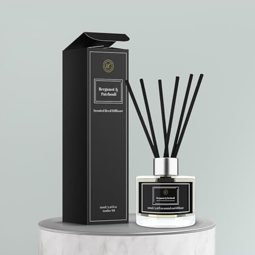 Image of Fusion of Bergamot & Patchouli in a 100ml Clear Glass Reed Diffuser Bottle | 8 Rattan Sticks for Sustained Fragrance | Elevate Your Space in the Bedroom, Living Room, Bathroom, Kitchen, Office