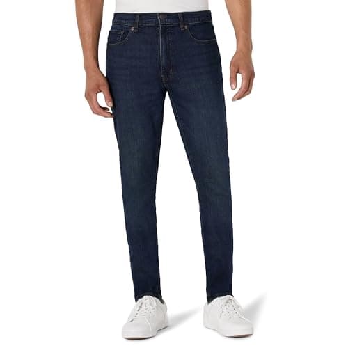 Image of Amazon Essentials Men's Medium Stretch Skinny-Fit Jeans, Tinted Dark Wash, 36W / 32L