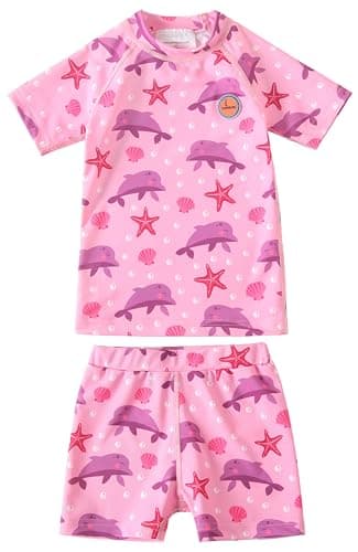 Image of Swimbubs Toddler Rash Guard Swim Set – Baby Swimwear Set with Short Sleeve Rash Vest & Swim Shorts, Kids Swimsuit Outfit for Beach, Pool & Holidays (2-3 Years, Pink Dolphin)