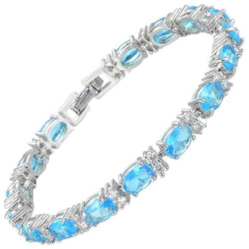 Image of RIZILIA Eternity Tennis Bracelet for Women - 7" Oval Cut Simulated Blue Topaz & Cubic Zirconia, 18K White Gold Plated, Elegant Everyday Jewelry, Secure Fold Over Clasp, Gift Ready with Pouch