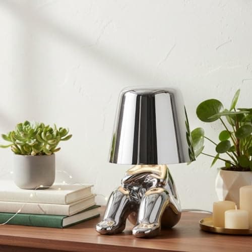 Image of NOUVO Modern LED Table Lamp with Unique Humanoid Design, Dimmable Touch Control, USB Charging Port, Energy-Efficient LED Lighting, Perfect for Bedroom, Living Room, Desk Use Silver Finish Cozy Pose