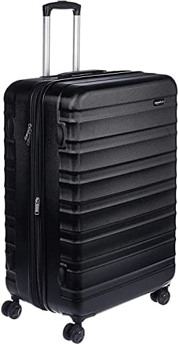 Image of Amazon Basics Hard Shell Large Suitcase - Expandable ABS Travel Luggage with 4 Double Spinner Wheels - Scratch Resistant and Lightweight Construction - 78 x 52.6 x 32cm - Black