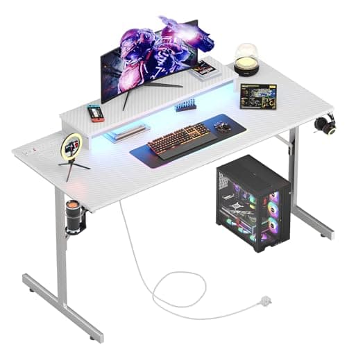 Image of Bestier Gaming Desk 131.6 CM with Power Outlets & LED Light Computer Desk with Monitor Stand Gamer Workstation with Cup Holder & Headset Hooks for Home Office Bedroom