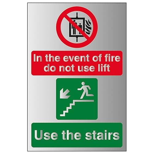 Image of V Safety In The Event Of Fire Do Not Use Lift/Use The Stairs Left 150 x 200 mm - Self Adhesive Vinyl - Aluminium Effect Safety Sign