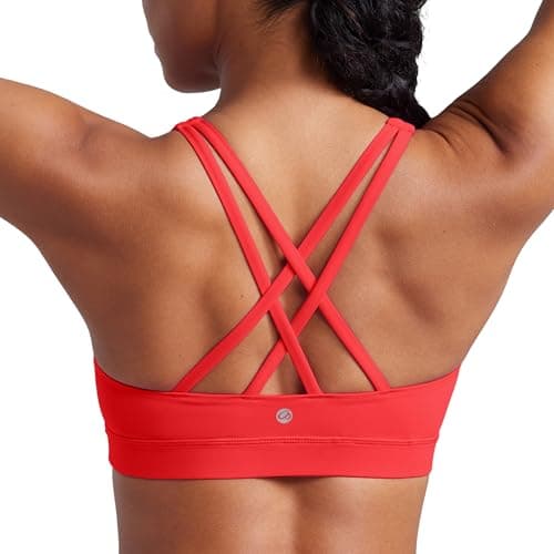 Image of CRZ YOGA Women's Naked Feeling Strappy Back Sports Bra - Mid Impact Wirefree Padded Workout Yoga Crop Top Deep Red M