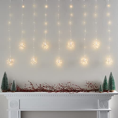 Image of Lights4fun Starburst Curtain Light 235 Warm White LEDs Plug in Timer Indoor & Outdoor Use (W) 1.2m