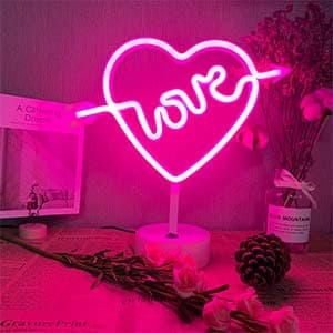 Image of ENUOLI Love Neon Light Signs Night Light with Pedestal Cupid Heart Neon Light Room Decor Battery & USB Powered Pink Signs Neon Lamps Pink Light up Bedroom Living Room Wedding Party Christmas