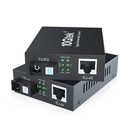 Image of a pair of Gigabit Ethernet Media Converters with Built-in Bidi Singlemode Simplex SC Transceivers, 10/100/1000M RJ45 to 1000Base-LX, up to 20km, with British Power Supply