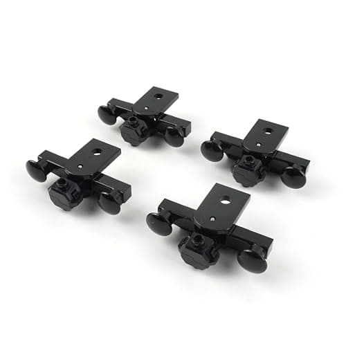 Image of 2 pairs of LEGO "railway clutch / buffer with magnet" in black. Includes golden helmet.