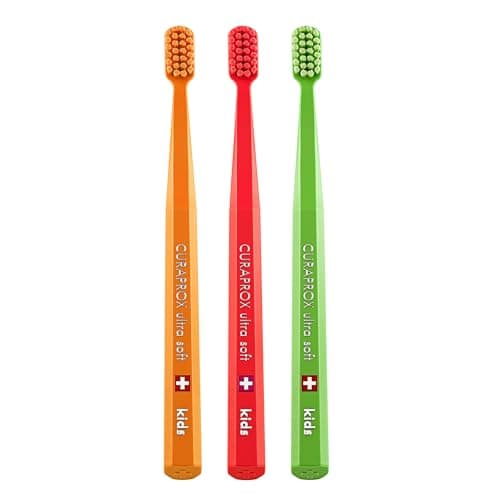 Image of Curaprox CS Kids Toothbrush– for Children Aged 4–12 | Ultra-Soft Gentle Cleaning | 5,500 Curen® filaments | Orange | Red | Green | Trio Pack | Made in Switzerland
