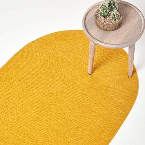 Image of HOMESCAPES Mustard Yellow Handmade Braided Oval Rug For Bedroom & Living Room Reversible Woven Cotton Rug, 90 x 150 cm