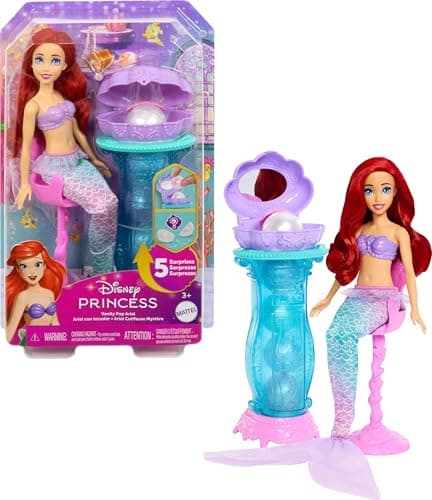 Image of Mattel Disney Princess Toys, Mermaid Arielle Fashion Doll with Removable Tail Fin, Dressing Table with 5 Repeatable Pop-Up Surprises and 5 Accessories, JBF86