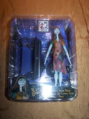 Image of Tim Burtons Nightmare Before Christmas Series 3 Sally Action Figure Features Sewing Machine and Santa Jack Costume Design Board