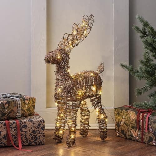Image of Lights4fun Christmas Indoor Light Up Rattan Reindeer Figure Decoration Warm White LED Battery Operated with Timer 55cm
