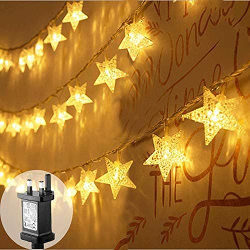 Image of FANSIR Plug in LED String Lights, 100 LED Star Fairy Lights Mains Powered 33ft 8 Modes Waterproof Outdoor Indoor String Star Light for Christmas Bedroom Wedding Party Balcony Decorations (Warm White)
