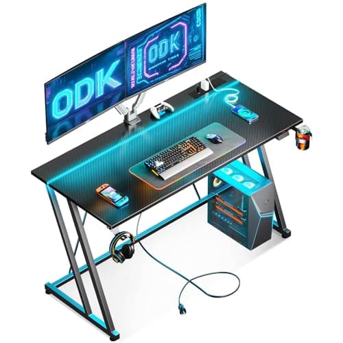 Image of ODK Gaming Desk with LED Lights & Power Outlet, Gaming Table with Cup Holder and Headphone Hook, Double Z Frame Design Computer Desks, Carbon Fiber Black PC Desk 120 cm
