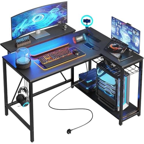 Image of Bestier 106.5CM L-Shaped Gaming Desk with RGB LED Lights Carbon Fibre Surface, 3 Power Outlets & 2 USB Ports, Reversible Corner Desk with Shelves & Hooks for Home Office & Small Spaces