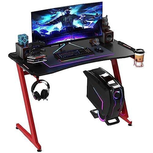 Image of HOMCOM 122 x 66 cm Gaming Desk, Carbon Fibre Covered Computer Desk, Gamer Workstation with Headphone Hook, Cup Holder and Gamepad Storage Rack, Black and Red