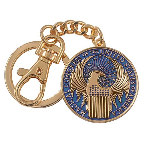 Image of The Noble Collection Fantastic Beasts MACUSA Emblem Keychain - 1.5in (3.5cm) Finely Detailed Gold Enamelled Keychain - Officially Licensed Film Set Movie Props Gifts