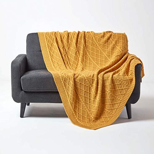 Image of HOMESCAPES Luxury Mustard Knitted Throw Large Cable Knit Cotton Blanket Hand Knit Warm and Cosy Dark Yellow 100% Cotton Textured Diamond Pattern Sofa and Bed Throw, 150 x 200 cm