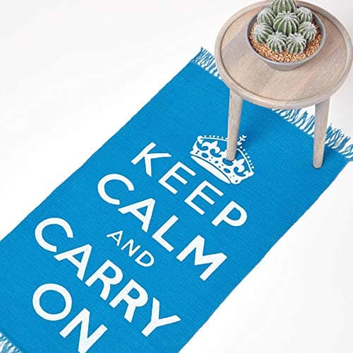 Image of HOMESCAPES Rugs For Bedroom, Handwoven 'Keep Calm and Carry On' Nostalgic Blue & White Living Room Area Rug, Ultra Soft 100% Cotton Carpet, Hand Block Printed - 60 x 100 cm