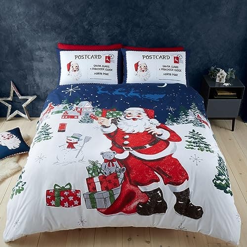 Image of Catherine Lansfield Retro Father Christmas Reversible Single Duvet Cover Set with Pillowcase Navy Blue