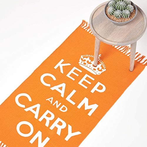Image of HOMESCAPES Rugs For Bedroom, Handwoven 'Keep Calm and Carry On' Nostalgic Orange & White Living Room Area Rug, Ultra Soft 100% Cotton Carpet, Hand Block Printed - 60 x 100 cm
