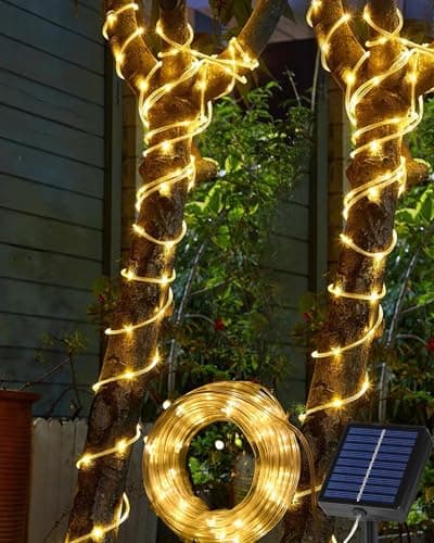 Image of Tacobey Solar Rope Lights Outdoor - 32.8Ft 100 LED Solar Tube String Lights,Timer Function, 8 Modes Waterproof Solar Powered Fairy Lights for Garden Tree Party Patio Deco - Warm White