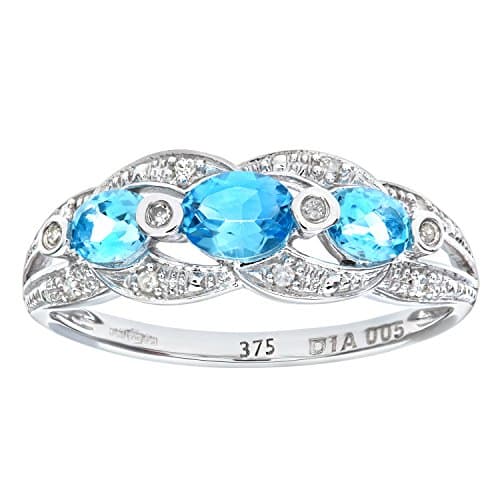 Image of Naava Women's 9 ct White Gold Blue Topaz and Diamond Fig 8 Design Ring