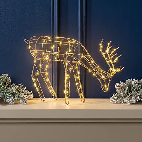 Image of Christow Light Up Reindeer Indoor Decoration, Small Champagne Gold Warm White LED Grazing Deer Ornament, Home Xmas Table Windowsill Figurine, Battery Operated with Timer (39cm x 24cm x 8.5cm)
