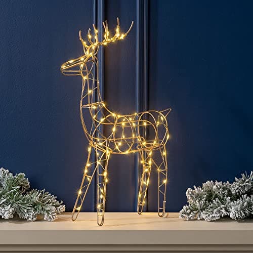 Image of Christow Light Up Reindeer Indoor Decoration, Small Champagne Gold Warm White LED Standing Deer Ornament, Home Xmas Table Windowsill Figurine, Battery Operated with Timer (48cm x 31cm x 8.5cm)