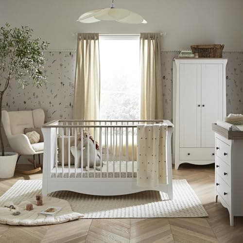 Image of CuddleCo Clara Nursery Furniture Set in White & Ash | Convertible Baby Cot Bed, Baby Changing Table with Drawers and Kids Wardrobe (3pc)
