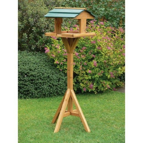 Image of Traditional wooden bird table garden birds feeder feeding station free standing