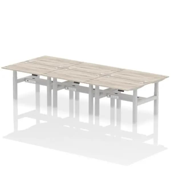Image of Air Air Back-to-Back 1200 x 800mm Height Adjustable 6 Person Bench Desk Grey Oak Top with Cable Ports Silver Frame HASCP6P12800GRYS
