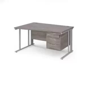 Image of Maestro 25 left hand wave desk 1400mm wide with 3 drawer pedestal - silver cable managed leg frame and grey oak top