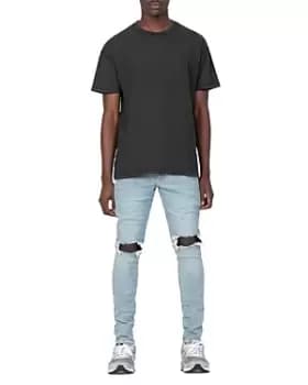 Image of Purple Brand Dropped Slim Fit Destroyed Jeans in Light Indigo